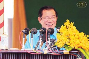 Prime Minister Hun Sen addresses a crowd of garment workers on Phnom Penh’s Veng Sreng Boulevard last week, making a speech in which he vowed to hold office for another 10 years. Facebook